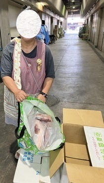 豚肉受け取りの写真