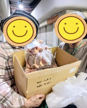 お肉受取二人