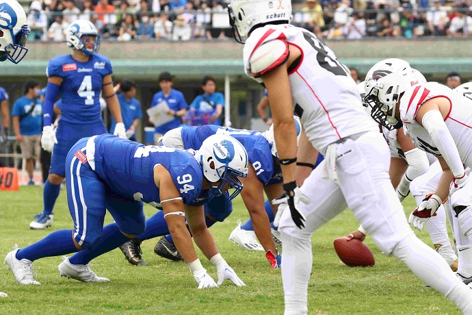 アメフト選手が並んでいる写真